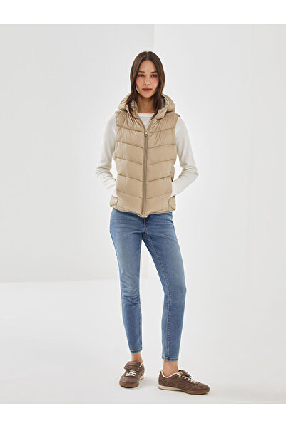 LC Waikiki Γυναικείο φουσκωτό γιλέκο με κουκούλα σε μπεζ χρώμα