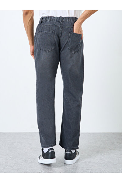 Styli Mid Rise Bootcut Faded Jeans