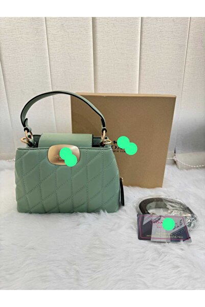 Com Shoulder bag, an exact copy of the famous brand. It comes with a box, a bag, and a warranty card with the same brand name.