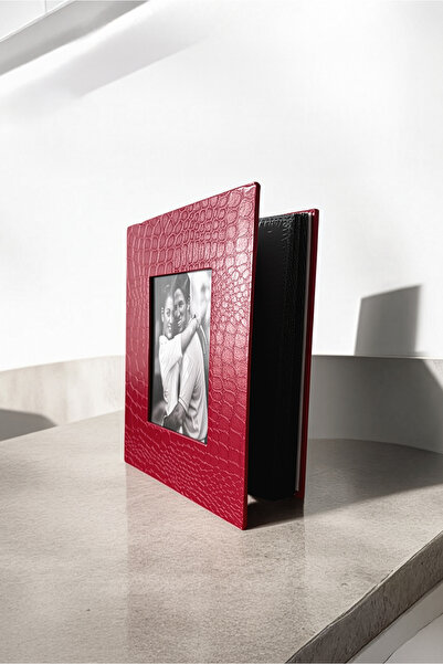 To Design Lab ألبوم يتسع لـ 200 صورة