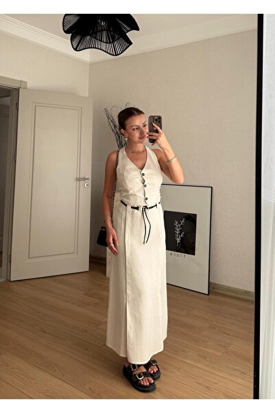 BAŞARAN Buttoned Vest and Belted Midi Skirt.
