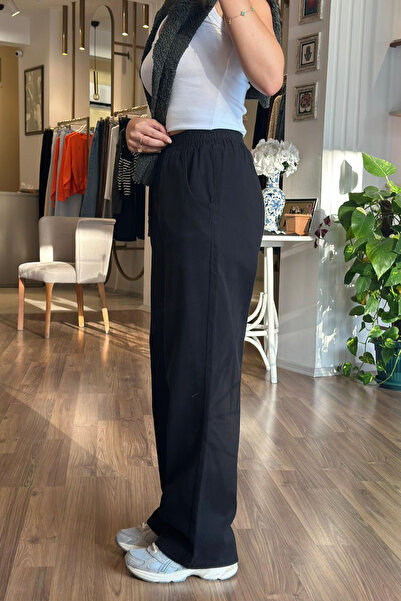 Unique Boutique Black Elastic Waist Gabardine Trousers