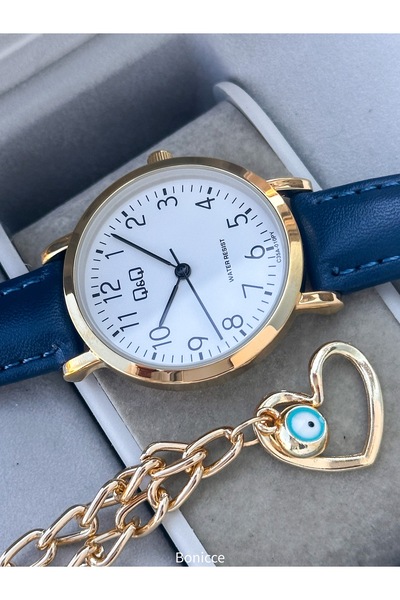 Q&Q ساعة يد من الجلد باللون الأزرق الداكن + سوار