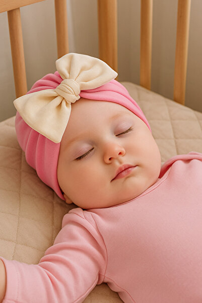 TAKIŞTIR Pembe Ve Krem Renk Kurdele Figürlü Bebek Saç Bonesi