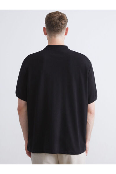 LC Waikiki Μαύρο ανδρικό μπλουζάκι με λαιμόκοψη πόλο