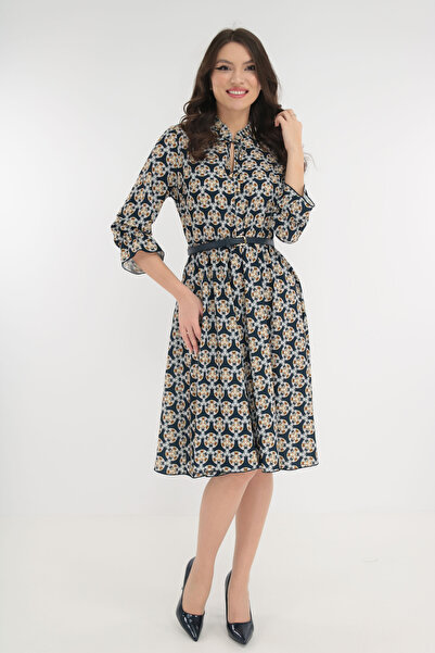 Vanessa Line RO Navy blue wrap dress with a navy blue belt at the waist