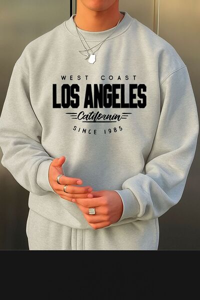 DM DOLCE MORE سترة رياضية مطبوعة بتصميم لوس أنجلوس من القطن الممشط بثلاث خيوط...