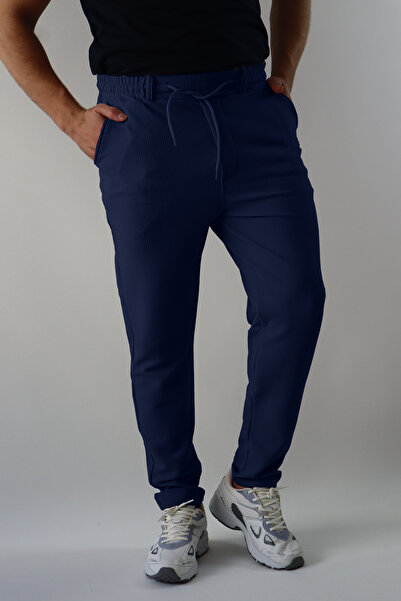 mw memowear جيب خلفي من قماش الحصى للجنسين مع سحاب باللون الأزرق الداكن