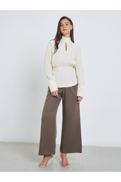 Styli Solid High Keyhole Neck Curved Hem Blouse
