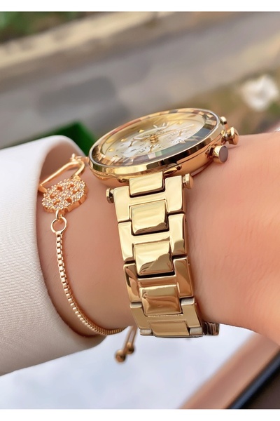 Daniel Klein Royal Kadın Kol Saati – Altın Çelik Kordon – Takvimli & Taşlı Yonca Bileklik Hediyeli