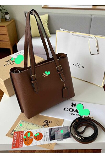 Tory Shoulder bag, an exact copy of the famous brand. It comes with a box, a bag, and a warranty card with the same brand name.
