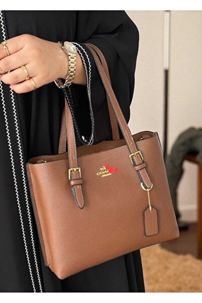 Coa Shoulder bag, an exact copy of the famous brand. It comes with a box, a bag, and a warranty card with the same brand name.