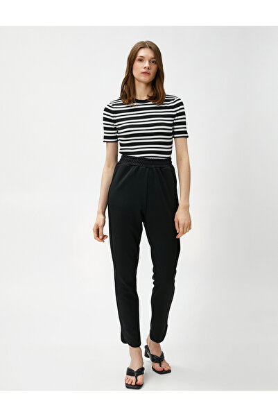 Koton Beli Lastikli Pantolon Dar Paça Yırtmaçlı