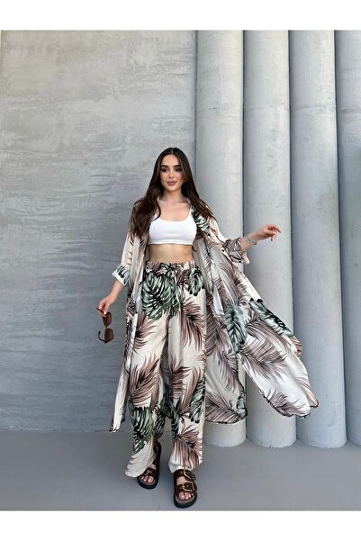 Tubik طقم قفطان نسائي مكون من قميص وبنطلون بتصميم منقوش مع جيوب ورباط عند الخصر