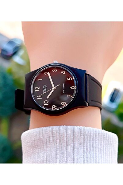 Q&Q 10 Atm Waterproof Silicone Strap Women's Wristwatch with 2 Years Manufacturer Warranty