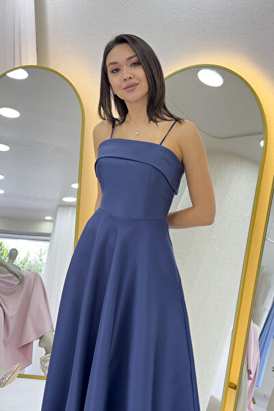 zks grup tekstil Синя вечірня сукня з тонким бретелем і кишенями