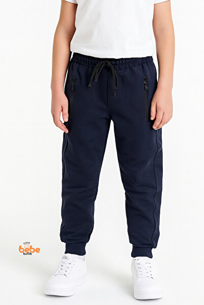 Trend Bebe Butik بنطلون رياضي للأولاد باللون الأزرق الداكن مع جيوب بسحاب - مو...