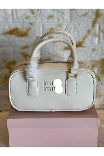 mm Shoulder bag, an exact copy of the famous brand. It comes with a box, a bag, and a warranty card with the same brand name.
