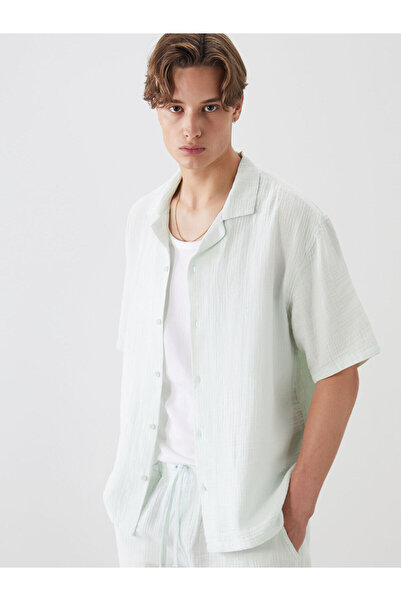 LC Waikiki قميص رجالي من الموسلين بأكمام قصيرة وياقة من بلو ريزورت