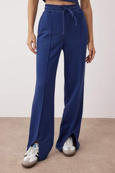 Trendyol Collection Синій трикотажний штани з резинкою на талії, з розрізом спереду TWOAW26EA00008