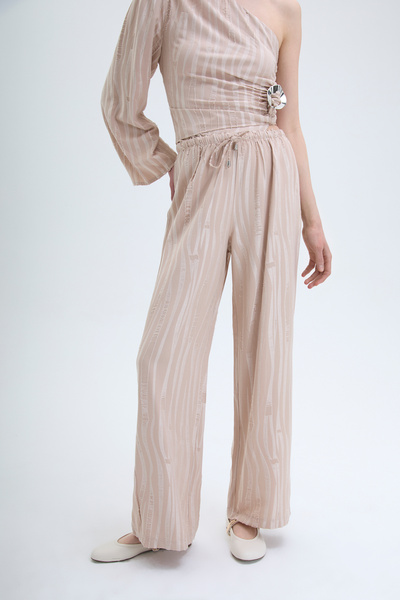 Quzu Beli Lastikli Bol Paça Dokulu Pantolon Bej