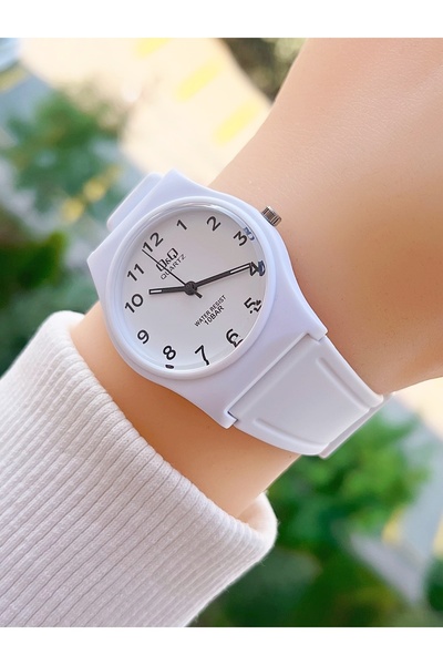 Q&Q 10 Atm Waterproof Silicone Strap Women's Wristwatch with 2 Years Manufacturer Warranty
