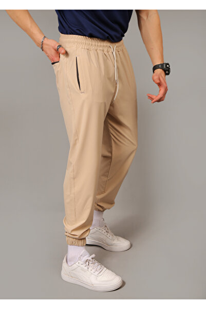 INFLUYENTE Ανδρικό μπεζ φαρδύ ύφασμα αλεξίπτωτου στυλ με ελαστικό πόδι