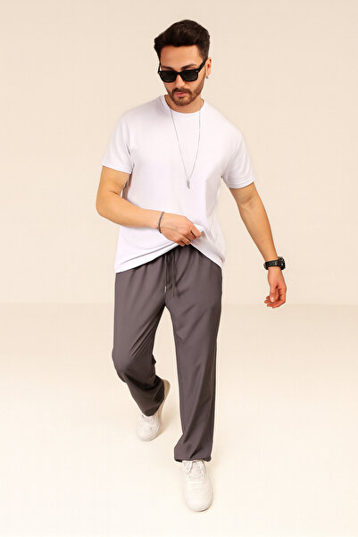 INFLUYENTE Men's Baggy Style Relaxed Fit Parachute Fabric Elastic Waist Wide Leg Trousers