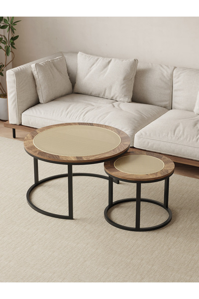 Un A set of coffee tables with an elegant design and perforated wood that adds a luxurious touch to your living room.