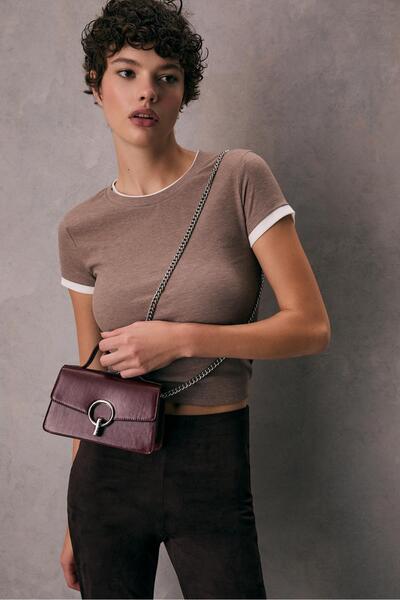 Stradivarius Crossbody bag with a round clasp