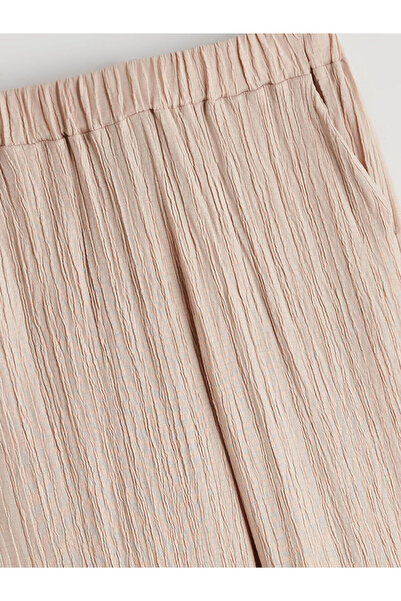 LC Waikiki Beige Elastic Waist Textured Girls' Trousers