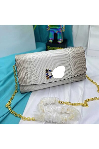 GUEE Shoulder bag, an exact copy of the famous brand. It comes with a box, a bag, and a warranty card with the same brand name.