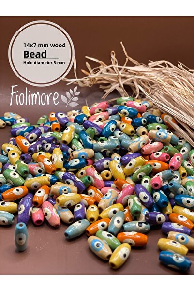 Fiolimore 14x7 ملم خرز خشبي على شكل حبة شعير (25 جرام 100 قطعة) قطر الفتحة 3 ملم لوح ملون مختلط
