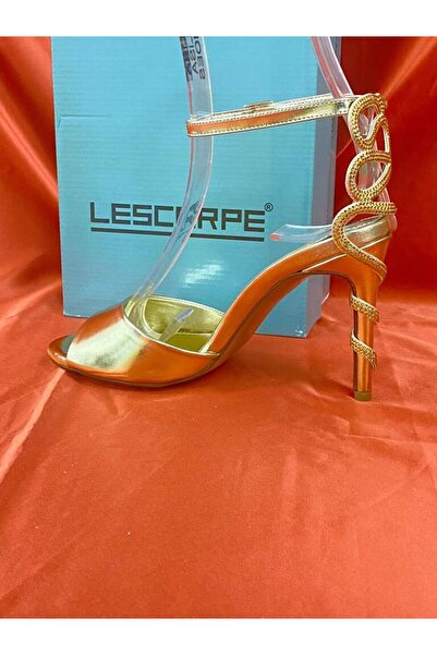 lescarpe LES024 ALTIN GOLD BİLEKTEN BAĞLAMALI YILAN TOPUK DETAYLI YÜKSEK İNCE TOPUKLU AYAKKABI STİLE