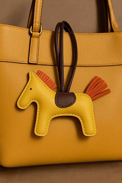 KİWİ AKSESUAR حقيبة تشارمي من الجلد الصناعي