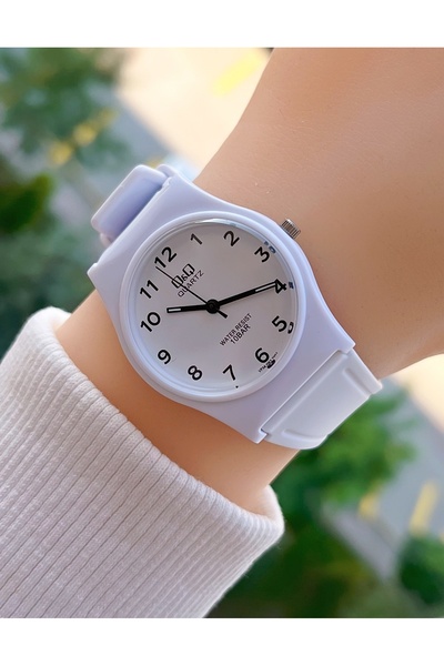 Q&Q 10 Atm Waterproof Silicone Strap Women's Wristwatch with 2 Years Manufacturer Warranty