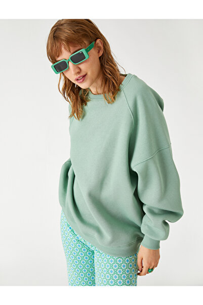 Koton سويت شيرت كبير الحجم بياقة دائرية مع بطانة من الصوف