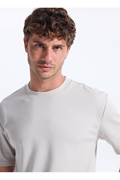 Reebok LC 1012 GARMEN ACT TEE Bej Yuvarlak Yaka Regular Fit Düz Erkek T-Shirt