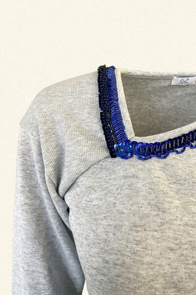 GZ Design Gray Knitted Sweatshirt with Blue Embroidery Detail and Asymmetric Collar