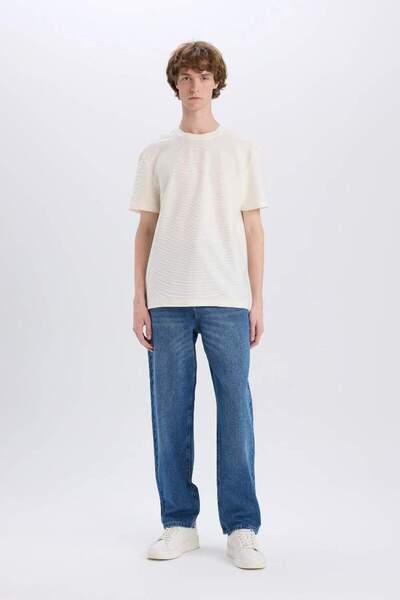 DeFacto %100 Pamuk Baggy Fit Geniş Kalıp Normal Bel Geniş Paça Soluk Efektli Jean Pantolon D7318AX25SP