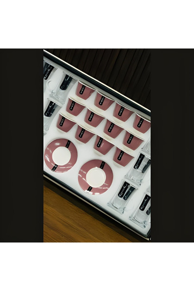 Generic 36-piece cup and saucer set with Arabic writing