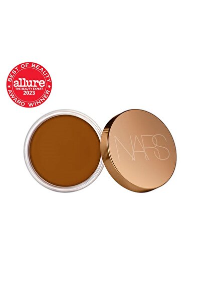 Nars BRONZING CREAM Kadifemsi yapılı Yumuşak, Mat Bitişlidir. Tene, Sıcaklık ...