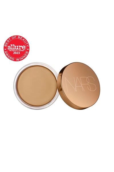 Nars BRONZING CREAM Kadifemsi yapılı Yumuşak, Mat Bitişlidir. Tene, Sıcaklık ...