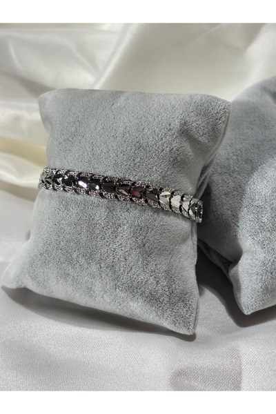 Uzak Işıklar سوار من الفولاذ الفضي السميك مرصع بحجر الزركون