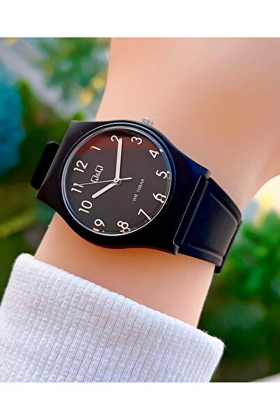 Q&Q 10 Atm Waterproof Silicone Strap Women's Wristwatch with 2 Years Manufacturer Warranty