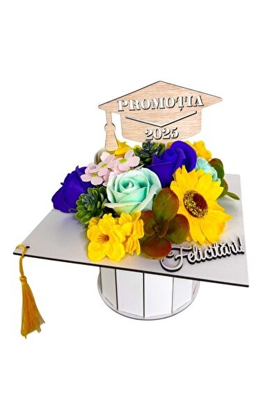 velve Graduation floral arrangement, in a white box in the shape of a toca wi...