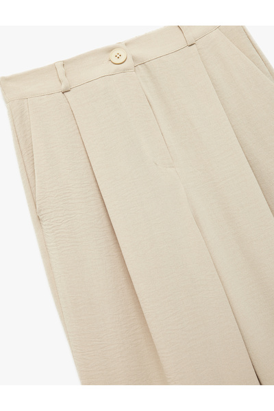 Koton Aerobin Kumaş Pileli Cepli Düşük Bel Bol Paça Pantolon