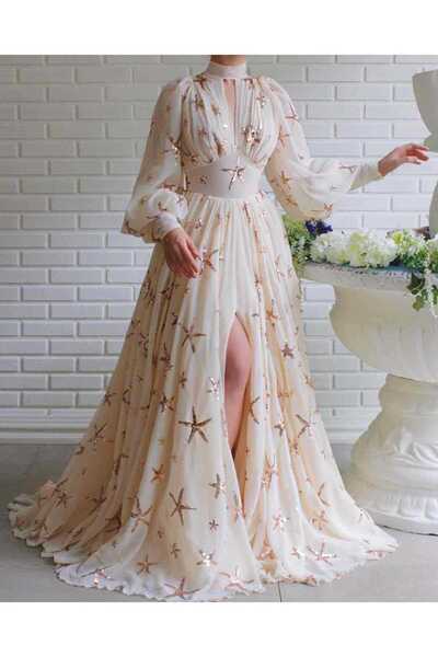 MorooJ Long cream evening dress embroidered with bronze sequin stars