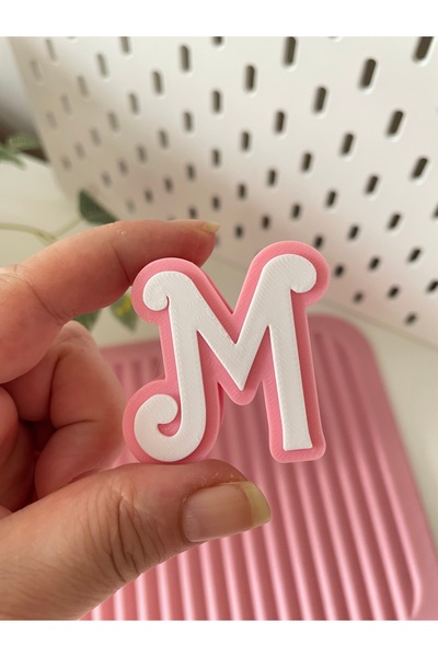 By Selen Suyolcu Letter Pipette Ornament