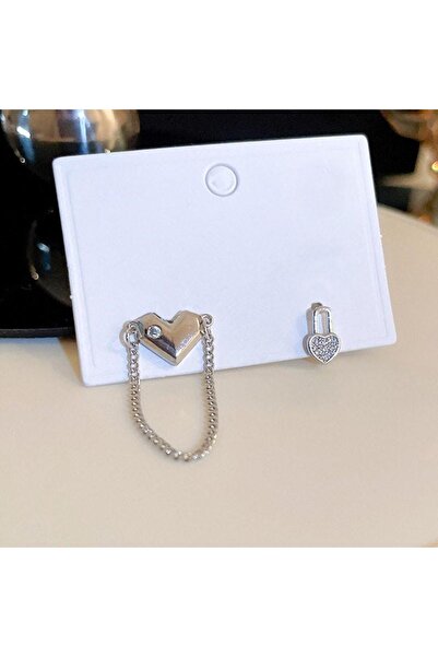 Pursehuit Cercei asimetrici de culoare argintie cu inimă și pietre de zirconi...